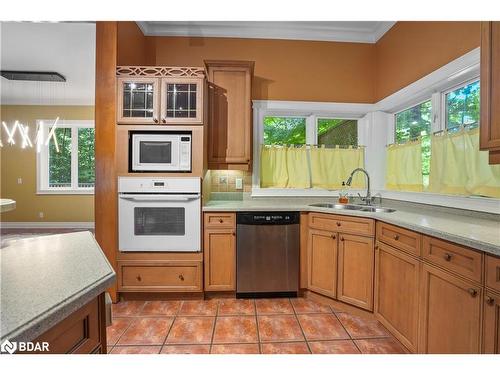 29 Glenhuron Drive, Springwater, ON - Indoor Photo Showing Kitchen With Double Sink