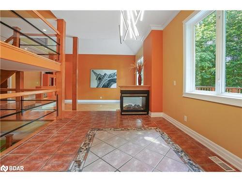 29 Glenhuron Drive, Springwater, ON - Indoor Photo Showing Other Room With Fireplace