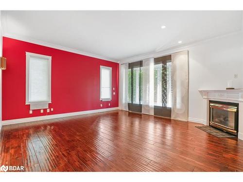 29 Glenhuron Drive, Springwater, ON - Indoor Photo Showing Other Room With Fireplace