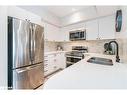 603-302 Essa Road, Barrie, ON  - Indoor Photo Showing Kitchen With Double Sink With Upgraded Kitchen 