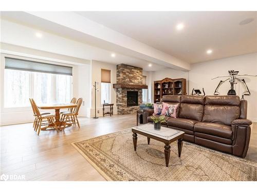 28 Timber Wolf Trail, Minesing, ON - Indoor Photo Showing Living Room With Fireplace