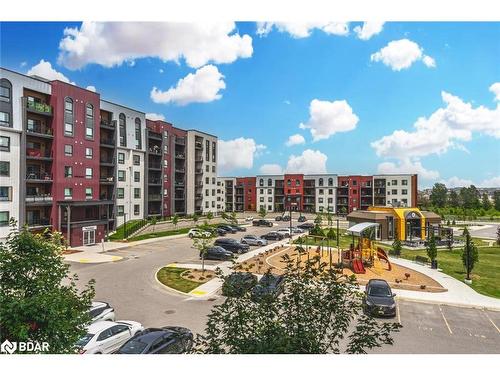 207-6 Spice Way, Barrie, ON - Outdoor With Balcony With Facade