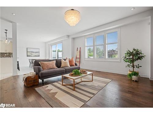 61 Oliver'S Mill Road, Springwater, ON - Indoor Photo Showing Living Room