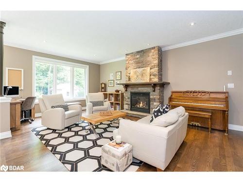 16 Boothby Crescent, Minesing, ON - Indoor Photo Showing Living Room With Fireplace