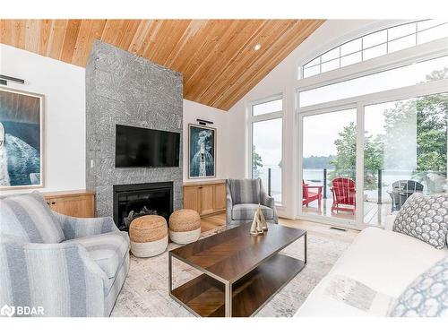 8-1841 Muskoka Road 118 W, Bracebridge, ON - Indoor Photo Showing Living Room With Fireplace