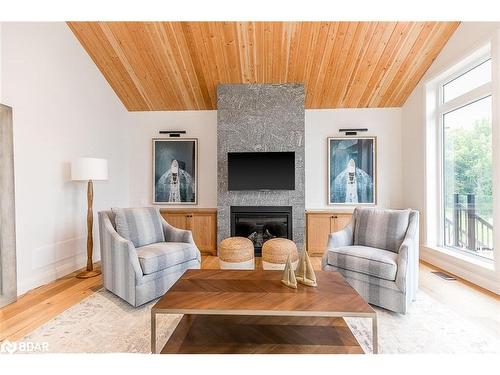 8-1841 Muskoka Road 118 W, Bracebridge, ON - Indoor Photo Showing Living Room With Fireplace