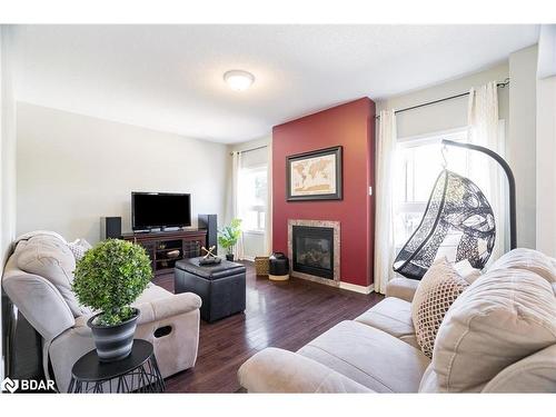 22 Commonwealth Road, Barrie, ON - Indoor Photo Showing Living Room With Fireplace