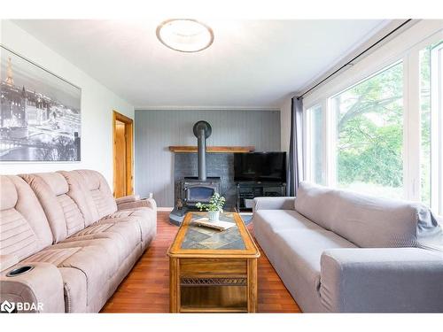 6582 Yonge Street, Innisfil, ON - Indoor Photo Showing Living Room With Fireplace