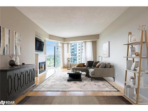 707-33 Ellen Street, Barrie, ON - Indoor Photo Showing Living Room With Fireplace