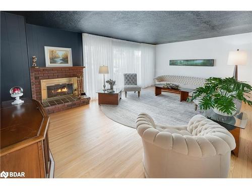 1009 Fairbairn Street, Peterborough, ON - Indoor Photo Showing Living Room With Fireplace