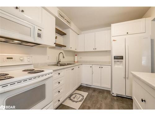 12 Chaucer Crescent, Barrie, ON - Indoor Photo Showing Kitchen With Double Sink