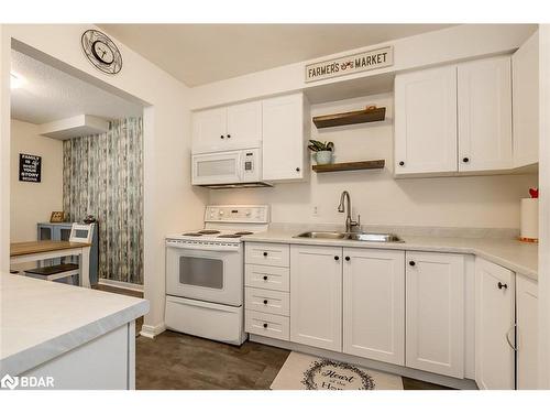 12 Chaucer Crescent, Barrie, ON - Indoor Photo Showing Kitchen With Double Sink