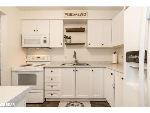 12 Chaucer Crescent, Barrie, ON - Indoor Photo Showing Kitchen With Double Sink