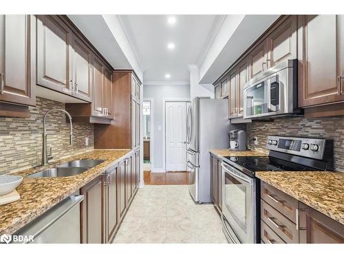 311-39 Ferndale Drive S, Barrie, ON - Indoor Photo Showing Kitchen With Stainless Steel Kitchen With Double Sink With Upgraded Kitchen