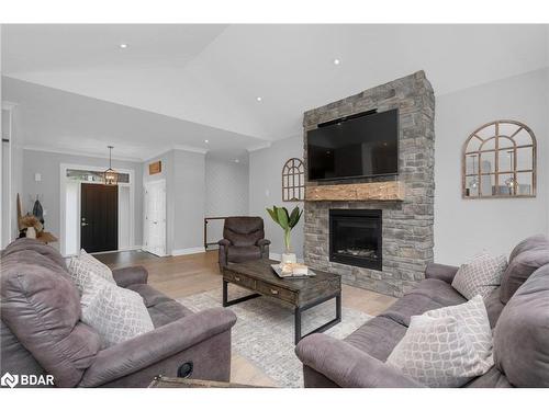 10 Walter James Parkway, Snow Valley, ON - Indoor Photo Showing Living Room With Fireplace