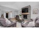 10 Walter James Parkway, Snow Valley, ON  - Indoor Photo Showing Living Room With Fireplace 