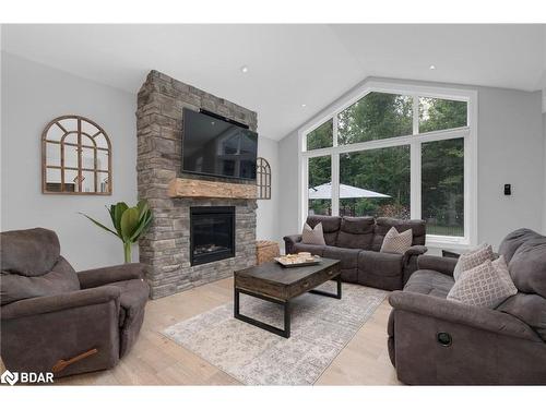 10 Walter James Parkway, Snow Valley, ON - Indoor Photo Showing Living Room With Fireplace