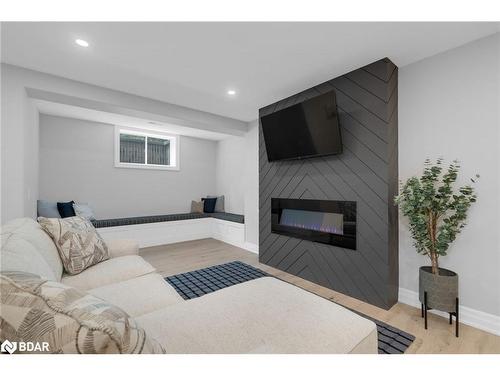 10 Walter James Parkway, Snow Valley, ON - Indoor Photo Showing Living Room With Fireplace