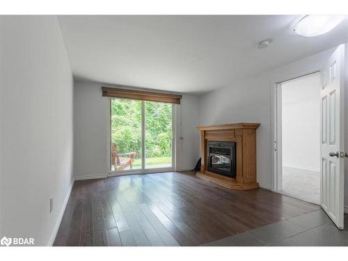 37 Loggers Run, Barrie, ON - Indoor Photo Showing Living Room With Fireplace