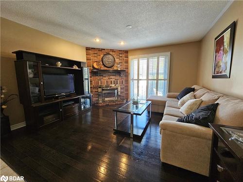 56 Bishop Drive, Barrie, ON - Indoor Photo Showing Living Room With Fireplace