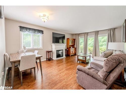 212-10 Coulter Street, Barrie, ON - Indoor Photo Showing Living Room With Fireplace