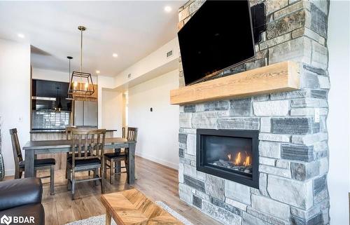 307-12 Beckwith Lane, The Blue Mountains, ON - Indoor Photo Showing Living Room With Fireplace