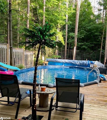 12 Pine Ridge Trail, Oro-Medonte, ON - Outdoor With Above Ground Pool