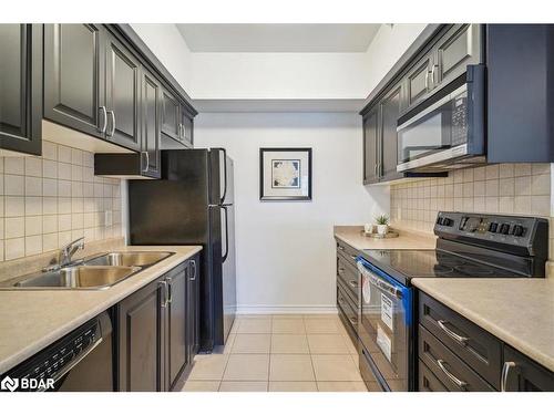 408-45 Ferndale Drive S, Barrie, ON - Indoor Photo Showing Kitchen With Double Sink