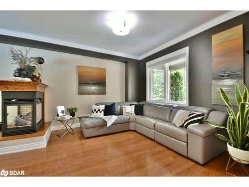 12 Lloyd Cook Drive E, Springwater, ON - Indoor Photo Showing Living Room With Fireplace