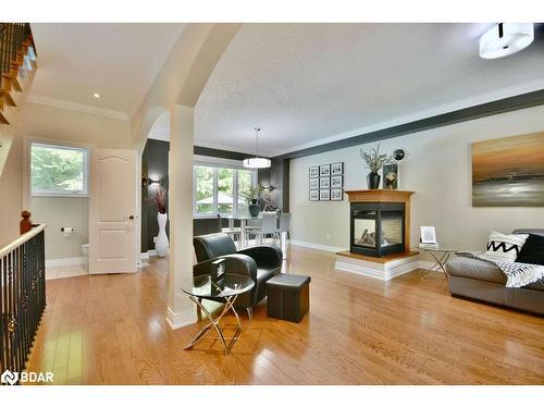 12 Lloyd Cook Drive E, Springwater, ON - Indoor Photo Showing Living Room With Fireplace