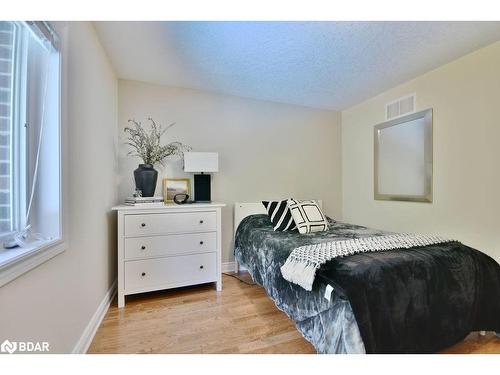 12 Lloyd Cook Drive E, Springwater, ON - Indoor Photo Showing Bedroom