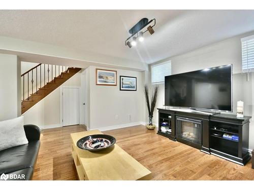 12 Lloyd Cook Drive E, Springwater, ON - Indoor Photo Showing Living Room