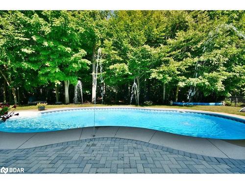 12 Lloyd Cook Drive E, Springwater, ON - Outdoor With In Ground Pool With Backyard