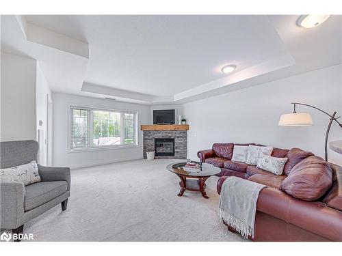 308-130 Steamship Bay Road, Gravenhurst, ON - Indoor Photo Showing Living Room With Fireplace