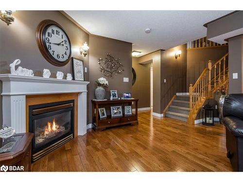 84 Kingsridge Road, Barrie, ON - Indoor Photo Showing Living Room With Fireplace