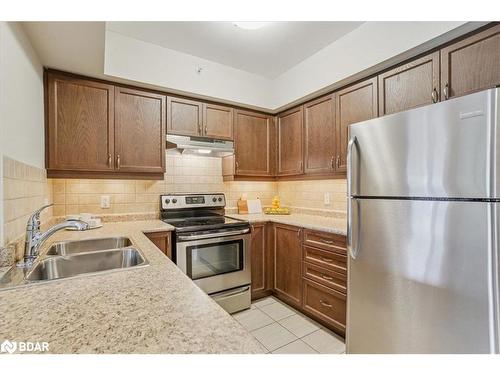 308-39 Ferndale Drive S, Barrie, ON - Indoor Photo Showing Kitchen With Double Sink