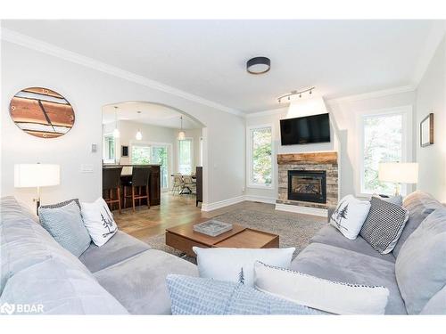 2 Reillys Run, Minesing, ON - Indoor Photo Showing Living Room With Fireplace