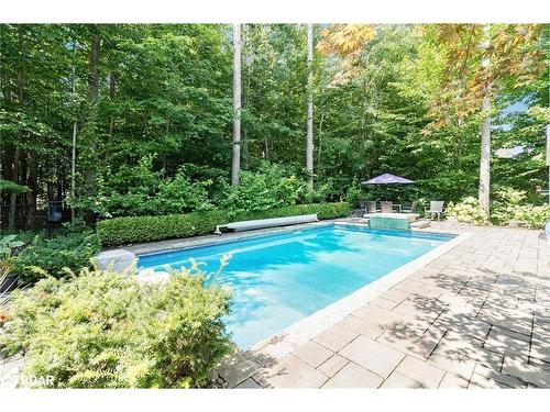 2 Reillys Run, Minesing, ON - Outdoor With In Ground Pool With Backyard