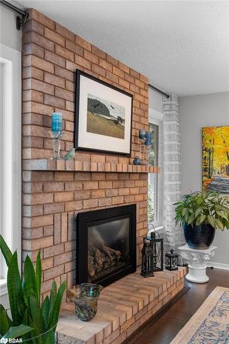 210 Anne Street N, Barrie, ON - Indoor Photo Showing Living Room With Fireplace