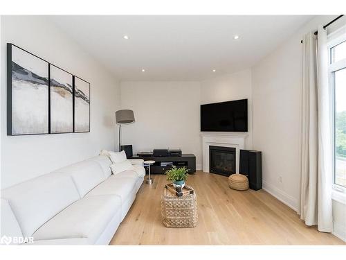 27 Muirfield Drive, Barrie, ON - Indoor Photo Showing Living Room With Fireplace