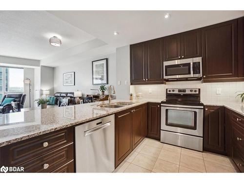 1109-33 Ellen Street, Barrie, ON - Indoor Photo Showing Kitchen With Stainless Steel Kitchen With Double Sink