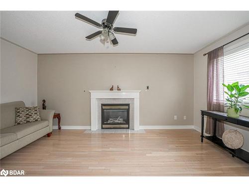 5 Michael Crescent, Barrie, ON - Indoor Photo Showing Living Room With Fireplace