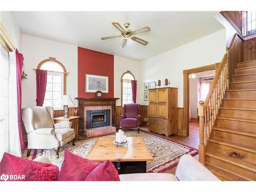 4 Thomas Street, Glencairn, ON - Indoor Photo Showing Living Room With Fireplace