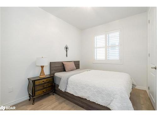 19 Cameron Street, Springwater, ON - Indoor Photo Showing Bedroom