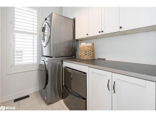 19 Cameron Street, Springwater, ON - Indoor Photo Showing Laundry Room