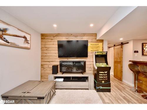 1025 Cook Drive, Midland, ON - Indoor Photo Showing Other Room With Fireplace