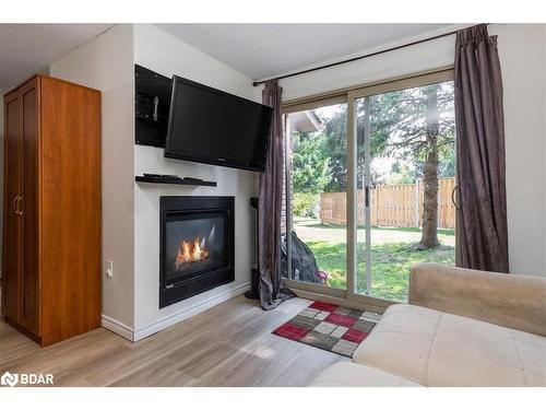 6 Pheasant Trail, Barrie, ON - Indoor Photo Showing Living Room With Fireplace