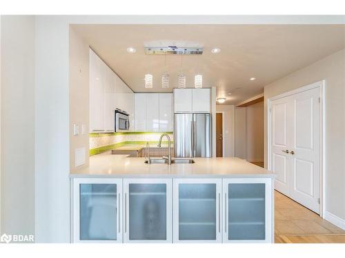 403-33 Ellen Street, Barrie, ON - Indoor Photo Showing Kitchen With Double Sink