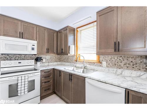 15 George Street, Innisfil, ON - Indoor Photo Showing Kitchen With Double Sink