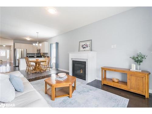 8 Orleans Avenue, Barrie, ON - Indoor Photo Showing Living Room With Fireplace